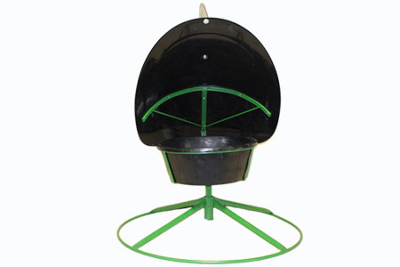 Mineral Feeder with a Wind Vane Hood on top for cattle and livestock
