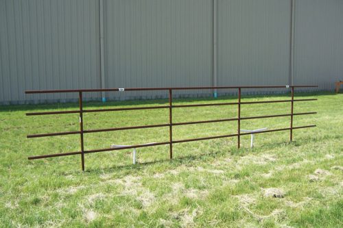 continuous fence panel standing the grass