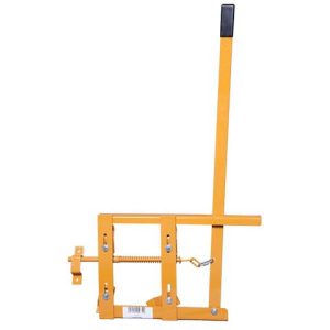 close up of bright yellow gate latch