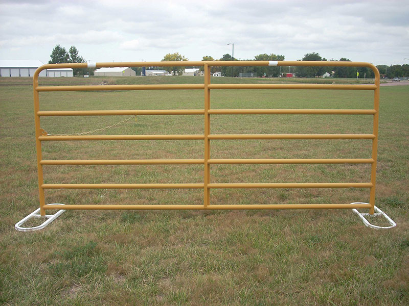 very tall gate in a pasture