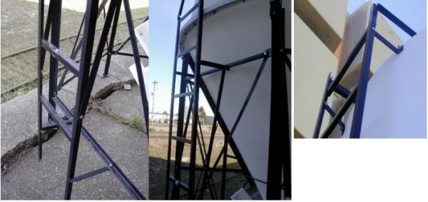 Steel access ladder mounted on 8.5-ton poly grain bin showing anti-slip rungs and frame attachment