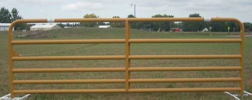 heavy-duty hog gate installed on a farm