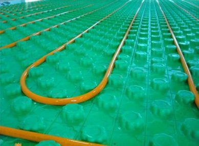 floor panels with curved tubing