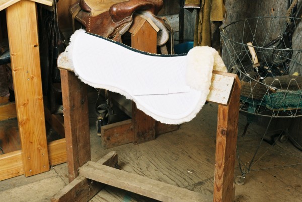 sheepskin saddle pad with white quilting