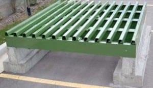 flat pipe cattle guard with concrete foundations