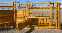 squeeze chute side door open to work on cattle