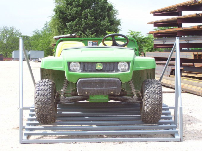 an atv on a cattle guard