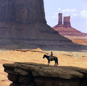 horse riding in the desert