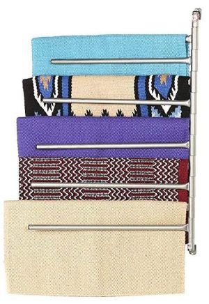 saddle blanket rack holding five colorful blankets