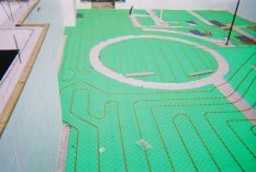 insulating floor panels covering a basement floor