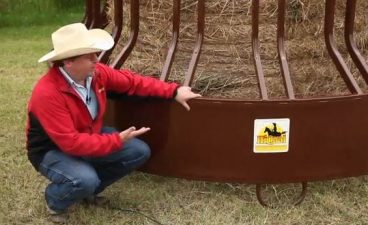 rancher leaning on a tombstone horse hay feeder