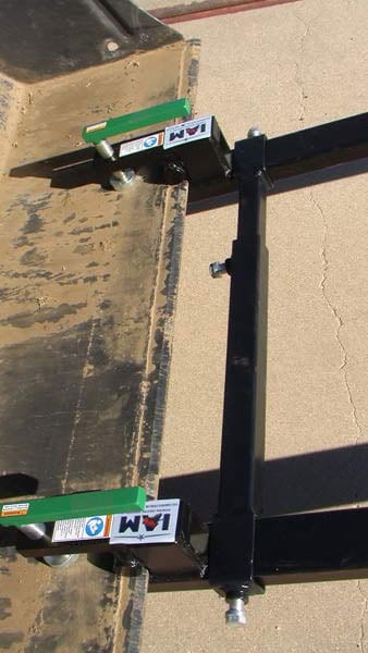 pallet fork bar installed on tractor bucket