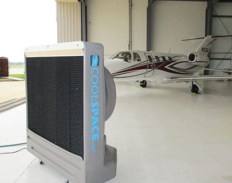 swamp cooler at airplane hanger