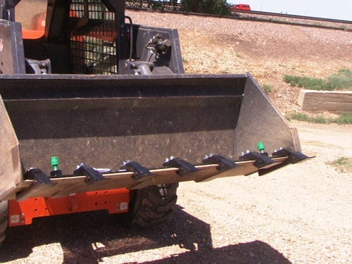 toothbar mounted to tractor bucket