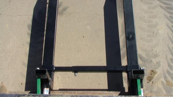 top view of pallet fork stabilizer bar on a tractor