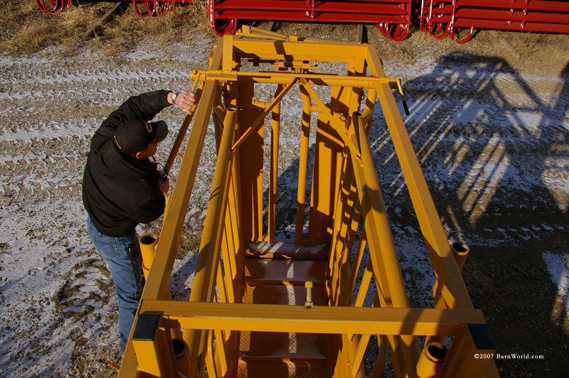 man adjusting headgate