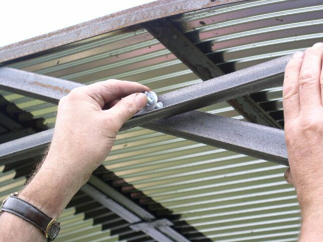 putting a bolt through the roof supports