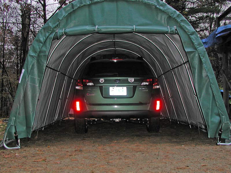 garage shelter with car inside