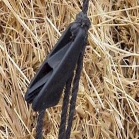 hay tarp cinch tie down on hay bale