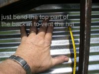 pushing open the back vent