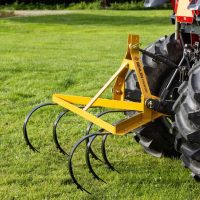 Cultivator Tractor Implement on Grass