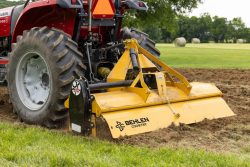Close-up of Rotary Tiller in use preparing soil
