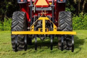 Cultivator on the back of a Tractor