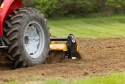 Rotary Tiller working in the dirt