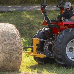 Sliding Bale Spear into Hay Bale