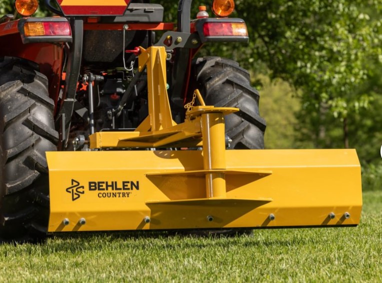 Grader blade positioned for finish grading