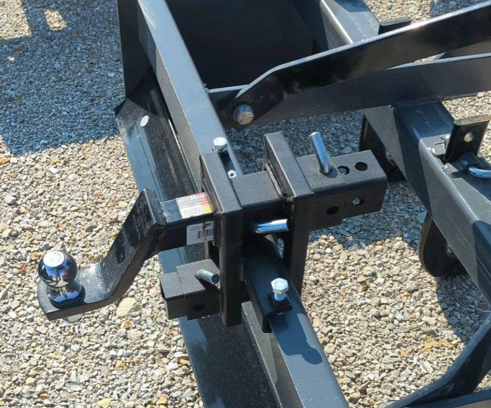 Little Bull hitch securely mounted on tractor blade