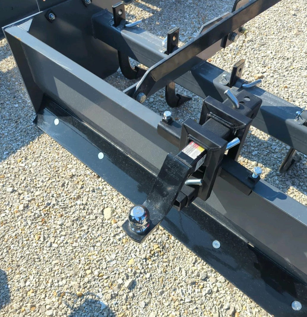 Tractor blade installed on box blade with Little Bull hitch
